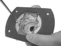 Turn the router base upside down and hold the dust extractor adaptor (15) in place (Fig.9). Fig. 9 7.