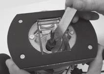Use a Phillips head screwdriver and rotate the fixing screws in a clockwise direction (Fig.10).