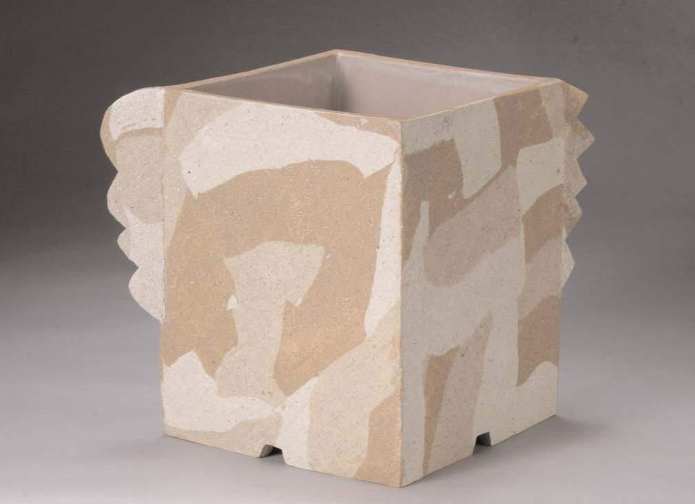 vessels in the shape of a rectangular cube to which functional elements such as a spout and a handle are added.