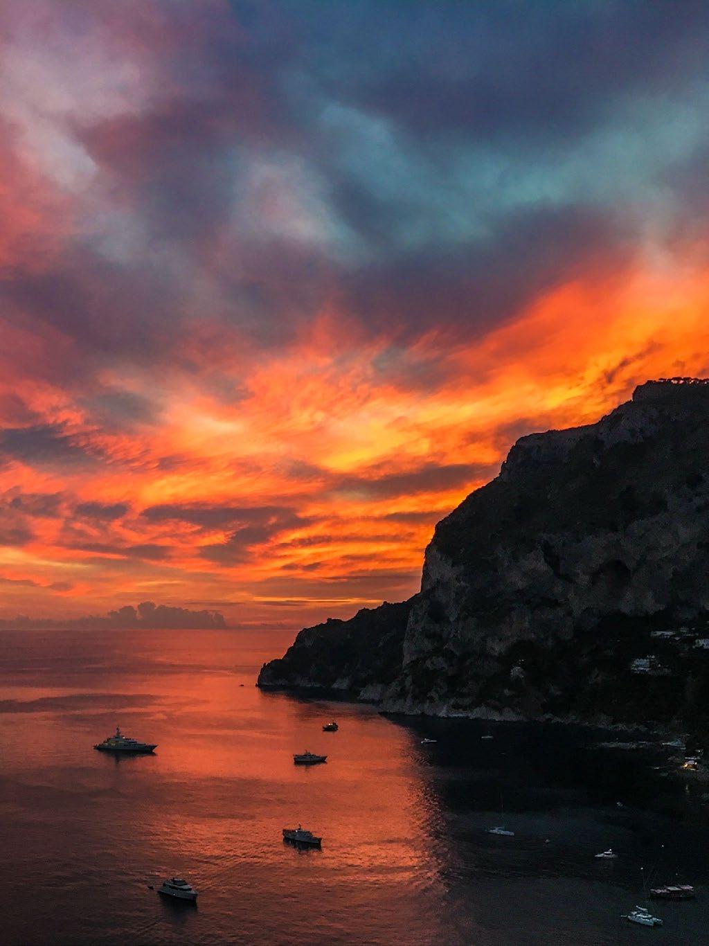 A dramatic sunset photographed on the island of Capri in Italy.