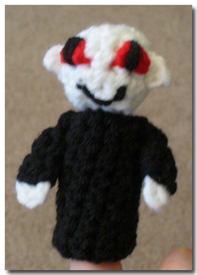 7. Sew arms to body. Voldemort (Black, White, Cherry Red) Work Body, Arms, Hands, and Ears as for Snape. Rnd 1: W/White, ch 2. Make 6 sc in Rnd 2: [sc inc] around (12 sc).