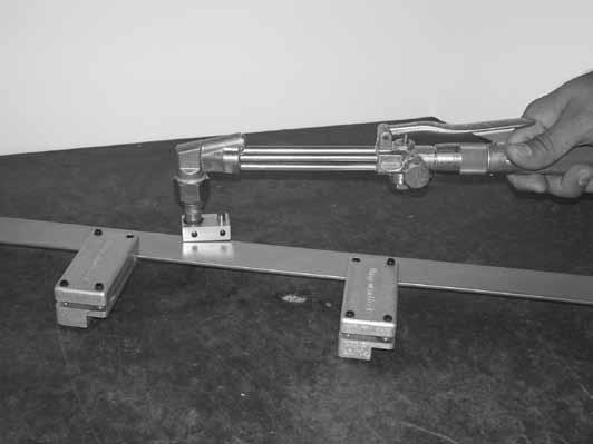 The two (2) magnetic blocks can be positioned any place along the 24 stainless steel cutting rail to accommodate any cutting