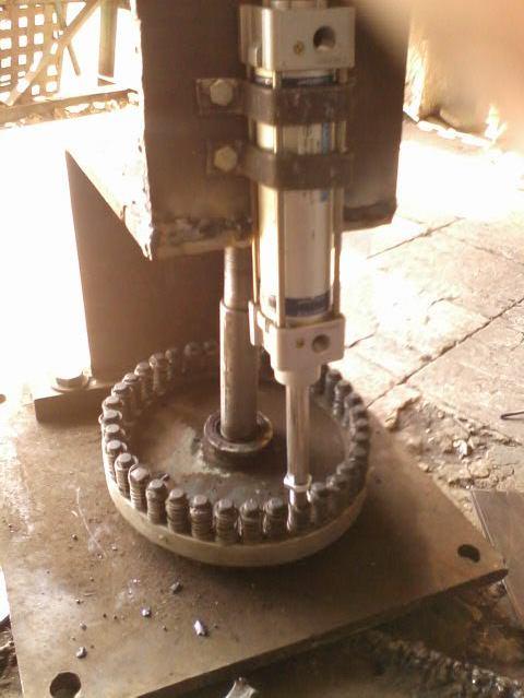 CONSTRUCTION:- Taking a gear and make it square gear on milling machine to adjust number punch in each teeth of gear. In that number punch spring & circlip is fitted as shown in fig.