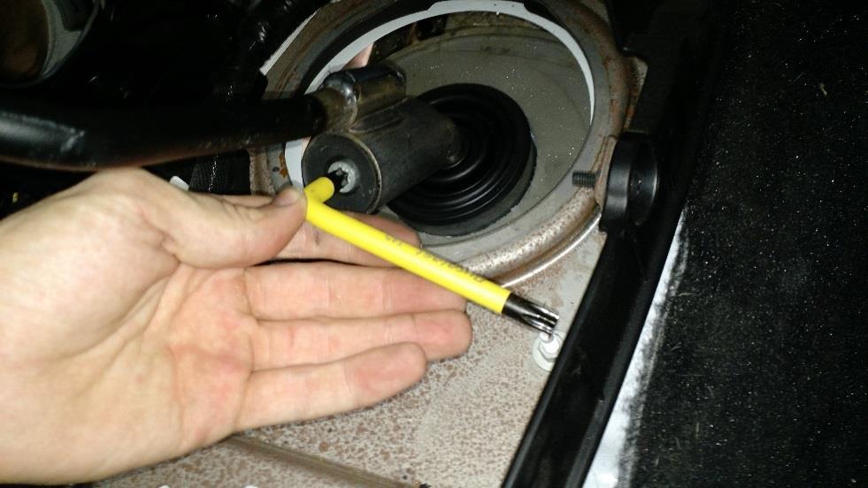 Remove the shifter with a T45 Torx wrench.