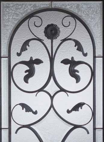 7300 Wrought Iron Collection This beautiful arched pattern combines a delicate floral and leaf motif with translucent and opaque glass to complete this special wrought iron offering.
