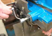 9) Set-up and Operation Insert the end mill in the spindle of the KM4000 Portable Key Mill, and clamp it on that shaft - it s that simple.
