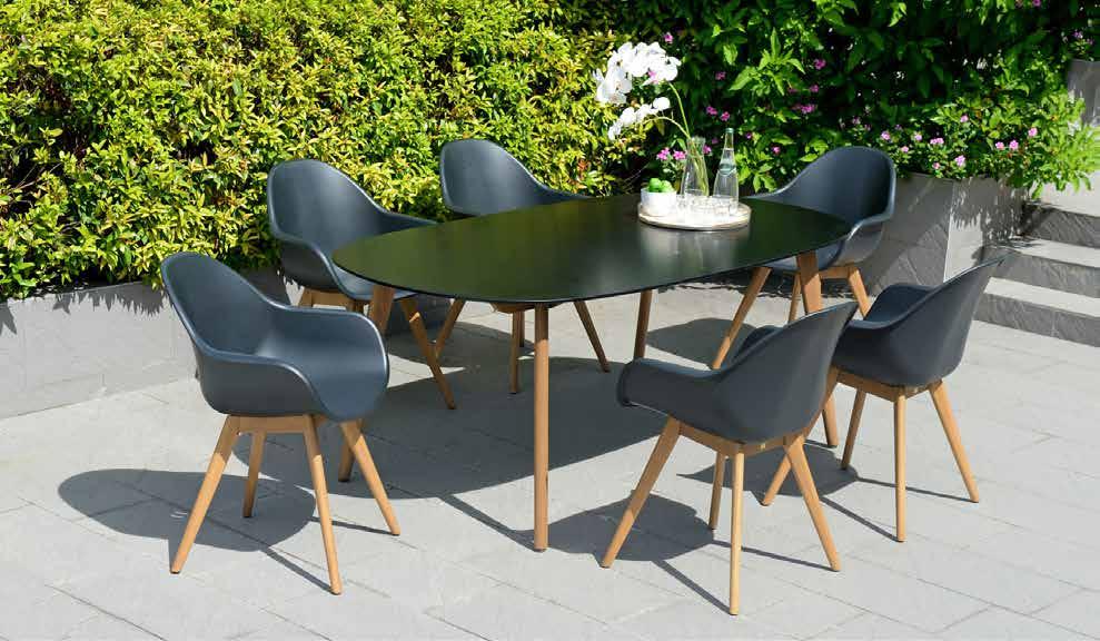 CHAMONIX TABLE WITH LAUSANE ARMCHAIRS. RESIN COMPOSITE SOLID BLACK TOP.