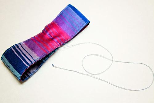 Wrap the 3" ribbon around the center of the loop.