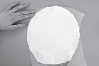 This causes three problems: The folded fabric leaves a fold line across the center of the headpiece.
