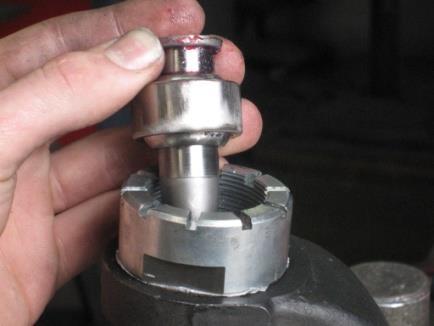 7: Once the stud or ball socket has been removed use a pry bar or screw driver to remove the seal