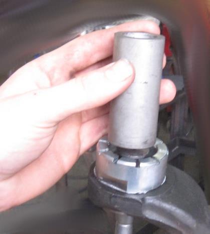6.2: Using the installation bushing insert the stud ball socket assembly into the upper cup (Fig 31).