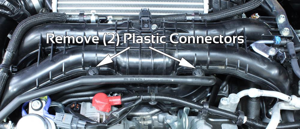 4. Locate and remove (2) small plastic connectors on intake manifold securing