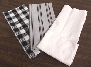 Supplies Needed: **3 linen tea towels - 18" by 28" (one solid-colored towel and two print towels) OR **1/2 yard of solid colored fabric and a total of one yard of print fabric -- 1/2 yard print