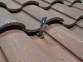 Ensure the lag screws will be installed in a solid portion of the roof framing member.
