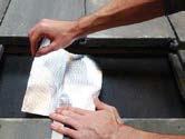Clean the surface around the Tile Hook with a brush of medium-stiff bristles.