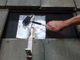 3) Apply flexible flashing centered laterally over tile hook and abutted to the tile hook arm.