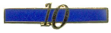 (1987) 3. 1987-2005 4. Bar; blue enamel with gold numeral and edging.