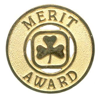Merit Award 1. H1028 2. POR (1987) 3. 1987-1991 4. Blue enamel bar with text MERIT AWARD with gilt lettering and edging. 5.