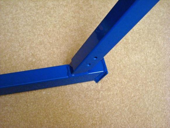 3. Attach the Handle Frame Assembly to the Forward Longitudinal Frame: Select the handle frame assembly (Photo
