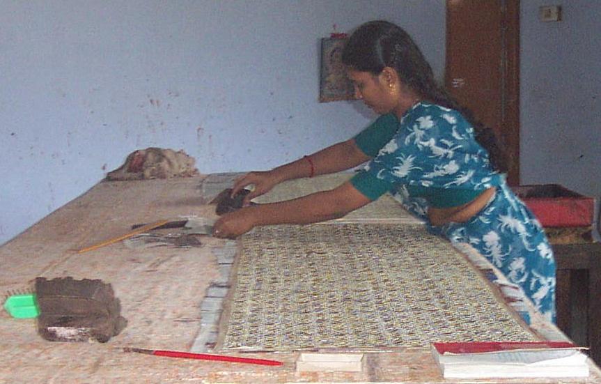 2. What is the role of wooden table and of woollen cloth in block printing? 5.