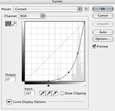 Hit CMD+M to apply a curve to the layer.