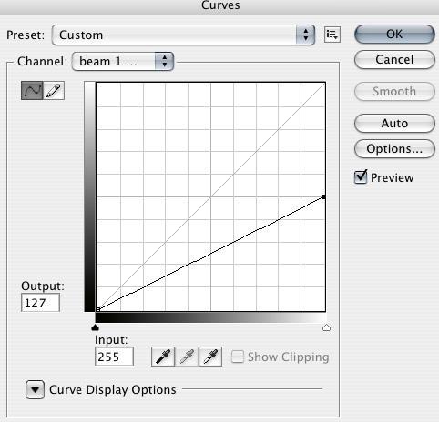 Add a layer mask by clicking on the Add Layer Mask button at the bottom of the layer palette. Select the mask by clicking on it in the layer palette then hit CMD+M to apply a curve to it.