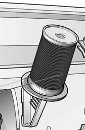 If you use large thread spools, the large holder (c) is placed in front of the thread. Slide the correct size spool holder in place so the flat side is pressed firmly against the spool.