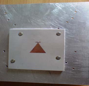 51 IV. EXPERIMENTAL VALIDATION A prototype of the vertex-fed triangular microstrip antenna which gives highest bandwidth is fabricated and tested experimentally.