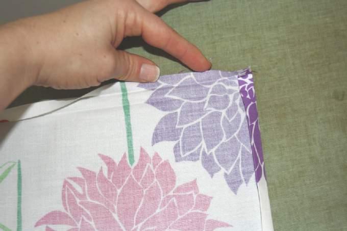 Fold down once more to ¼ inch and press again. Repeat with other side.