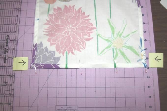 12 Pin the bottom edge and sew between