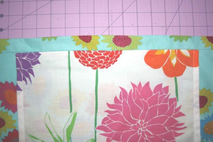 Sew close to the top folded edge making sure not