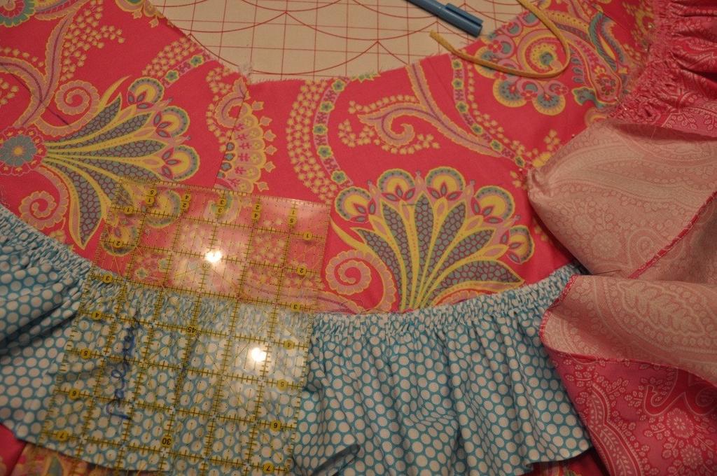 Using a three-step zigzag, sew using thread to match the spaghetti bias.