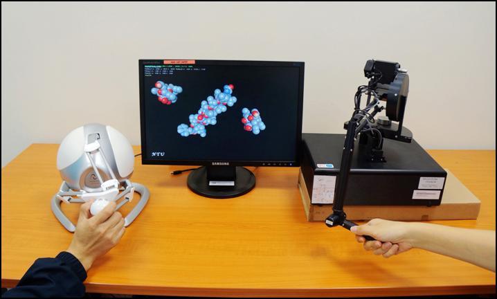 manipulation with multiple haptic devices. In this collaborative molecular docking system, we use the CHAI library for computer haptics and real-time simulation.