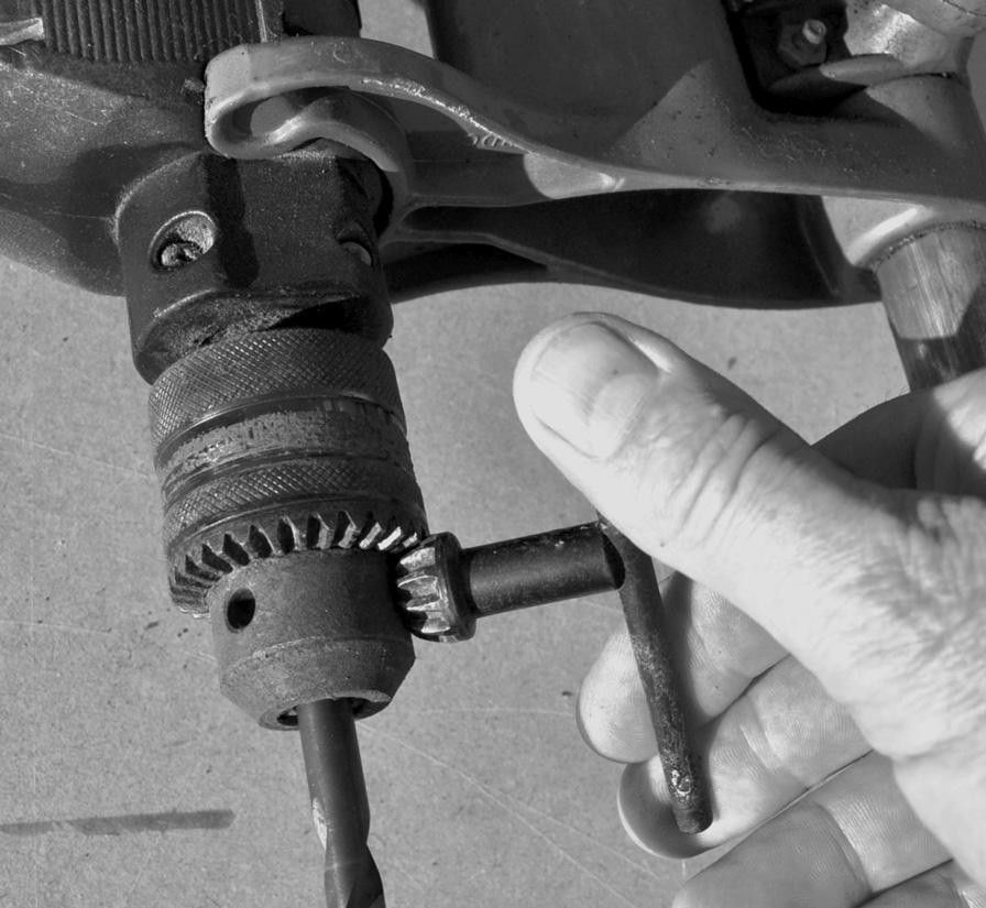 (iii) 16 Give three safety precautions a user should employ before using the drill stand to drill sheet metal. 1... 2... 3... [3] (iv) Brass bushes have been used on Fig. 6.