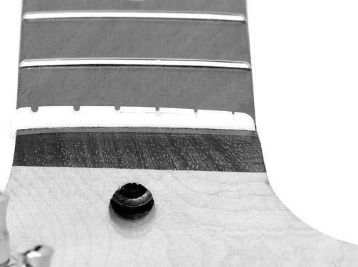 Strap Buttons Installing Nut The strap buttons are positioned on the guitar, as shown in Figure 23. Bass Horn Components and Hardware Needed: Qty Guitar Body... 1 Nut... 4 Neck.