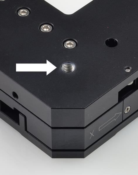 5 Installation Figure 7: M-686: One of four M6 mounting holes in the upper platform (see arrow) Prerequisite You have read and understood the General Notes on Installation (p. 17).