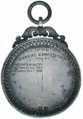 (2) $30 lot 2656 2658* Boys Brigade, handcrafted award medal in silver (39mm) with loop mount atop a scroll and