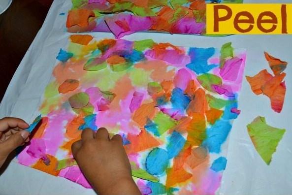 Then, explore painting on both construction paper and sandpaper.