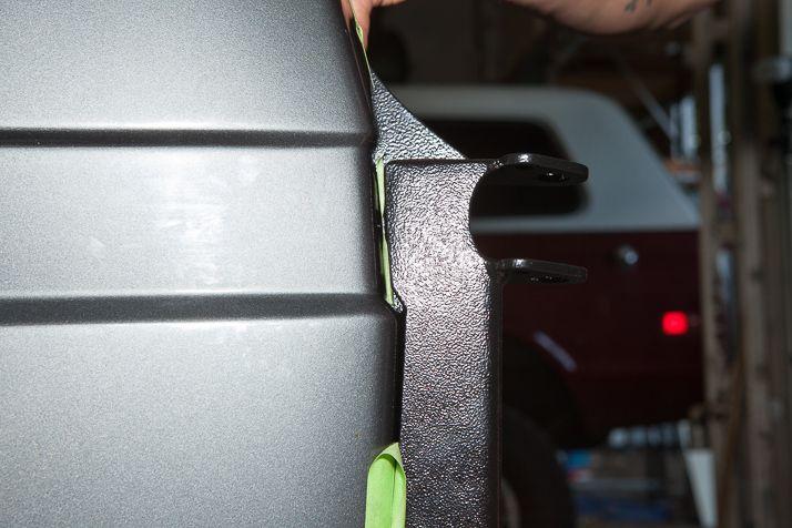 Line up the Main Support Bracket to the contour of the van s body lines.
