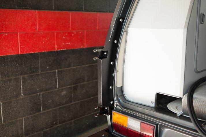 Reinstall the rubber door seal onto the van.