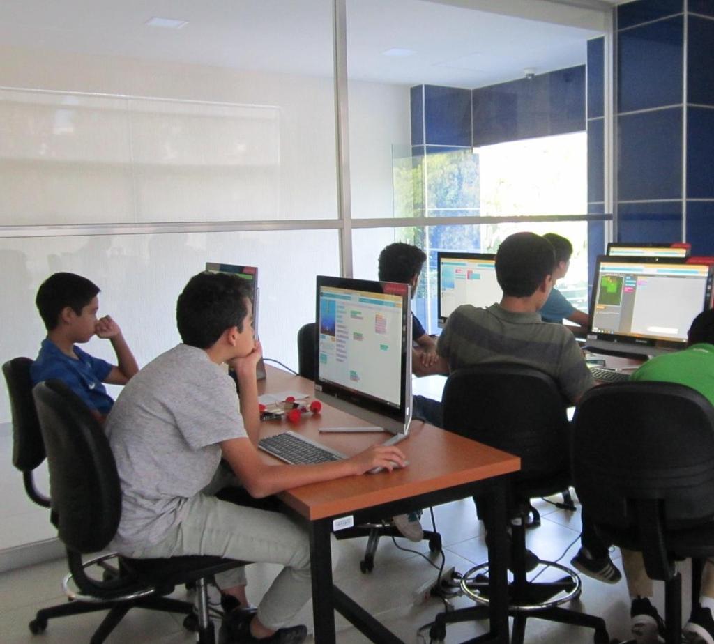 Figure 4 shows some students programming a mobile app to control the steering system
