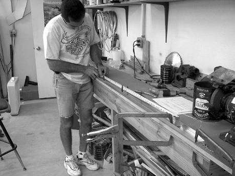 Page 14 Technical Support: mark@teamrocketaircraft.com Here Luis is measuring the correct positions for the hinge brackets.