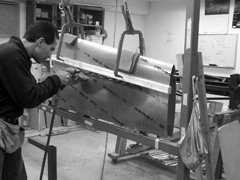 Page 34 Technical Support: mark@teamrocketaircraft.com We have different clamps for holding the skin in place.