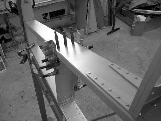 Technical Support: mark@teamrocketaircraft.com Page 51 As with the H stab ribs, use small strips of metal to align the ribs with the spar before drilling.