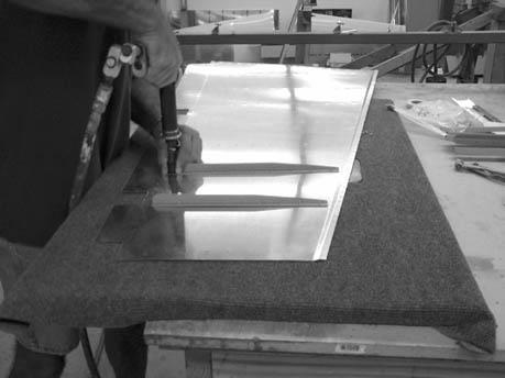 Technical Support: mark@teamrocketaircraft.com Page 61 RIVETING THE STIFFENERS TO THE RUDDER SKIN Disassemble and deburr the holes.