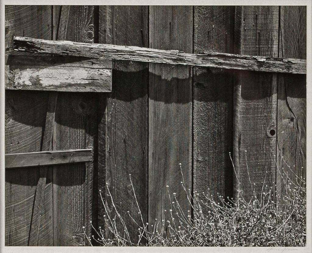 Fence, South San Francisco, California (1936) 7-1/2 x 9-1/2 inches, mounted Signed in pencil on mount; with photographer s label, titled and dated in pencil, annotated in type, on mount verso.