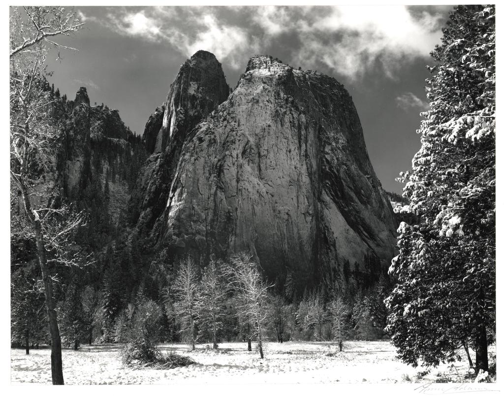 ANSEL ADAMS (American, 1902 1984) Cathedral Rocks, Winter, Yosemite Valley, California (ca. 1943) 7-3/16 x 9-1/4 inches, mounted Signed in pencil on mount; signed and titled in ink, on mount verso.