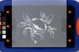 With the large embossing tip, solid emboss all motifs. Slowly stretch the paper by using a light hand to lightly emboss the motif.