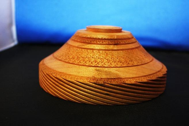 The pictures below are on a Maple bowl using the texturing