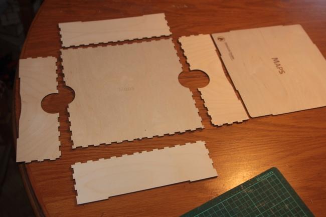 The pieces are almost fully cut out and have tiny joints to hold them in place while in transit.